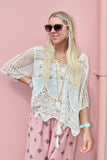 Scalloped floral crochet top