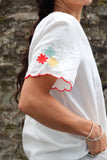 Red embroidered trim top