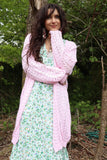 Pink open knit cardigan