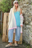 Pink whipstitch and cream cardigan