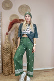 Embroidered green trousers