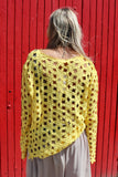 Yellow open-knit crochet top