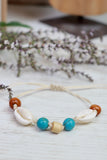 Circular beaded cowrie bracelet