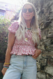 Pink floral shirred blouse