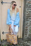 Soft blue ruffle sleeve cardigan