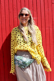 Yellow open-knit crochet top
