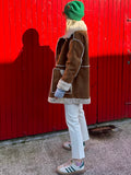 Tan suede and faux fur lined coat on