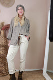 Cream cord trousers with frill pockets