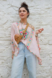 Floral embroidered pink poncho top