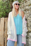 Pink whipstitch and cream cardigan