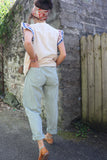 Sage green striped trousers