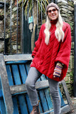 Oversized red cable knit jumper