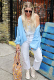 Soft blue ruffle sleeve cardigan