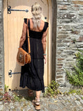 Black flutter sleeve dress