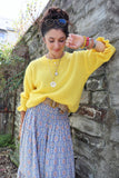 Ruffle sleeve lemon jumper