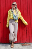 Yellow open-knit crochet top
