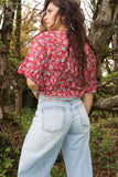 Red floral wrap top