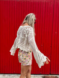 Scalloped floral crochet top