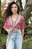 Red floral wrap top