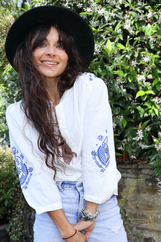 Blue embroidered button down blouse