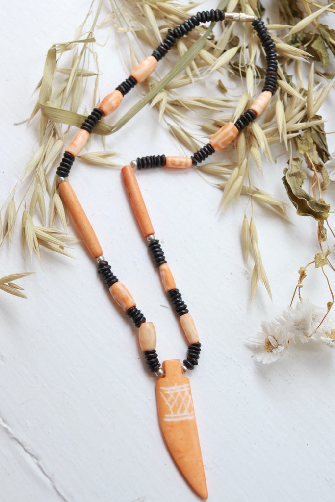 Orange beaded horn necklace