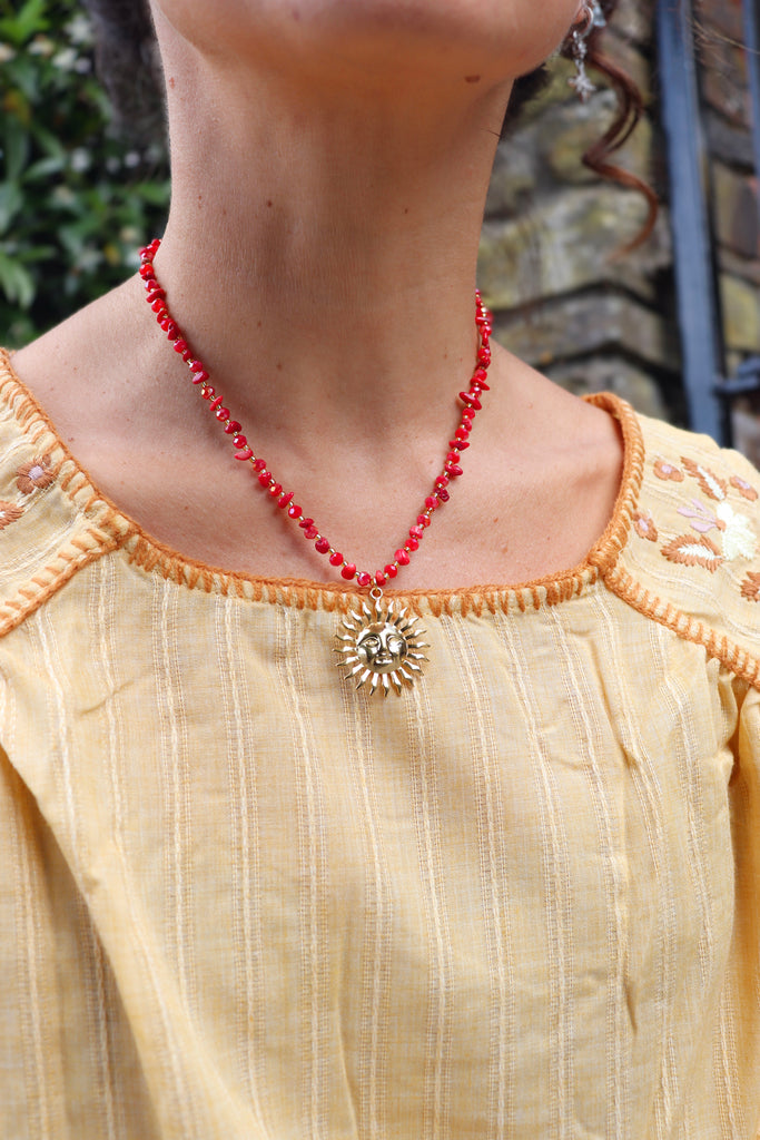 Gold sun and agate beaded necklace