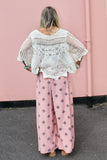 Scalloped floral crochet top