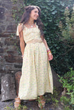 Floral yellow shirred dress