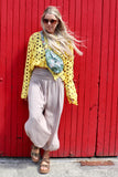 Yellow open-knit crochet top
