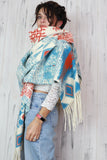 Geometric knit poncho scarf