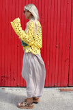 Yellow open-knit crochet top