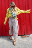 Yellow open-knit crochet top