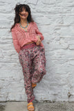 Pink paisley trousers