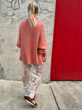 Oversized coral jumper
