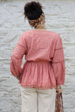 Pom pom detail tiered peach blouse