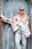 Pink floral crochet cardigan