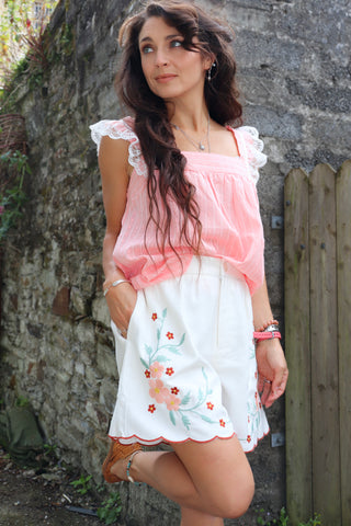 Floral embroidered linen shorts
