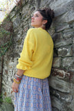 Ruffle sleeve lemon jumper