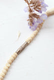 Horn and cream beaded necklace