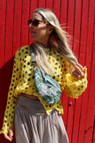 Yellow open-knit crochet top
