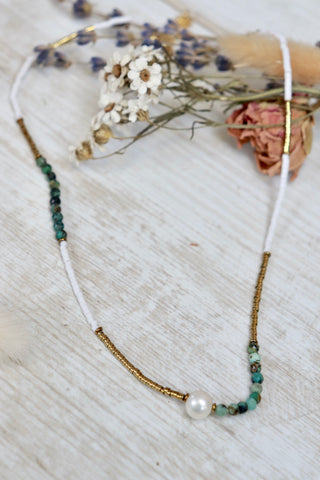 Gold and green beaded necklace with pearl