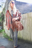 Fringe camel handbag