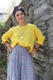 Ruffle sleeve lemon jumper