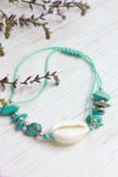 Turquoise beaded cowrie bracelet