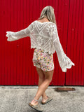 Scalloped floral crochet top