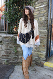Embroidered navy cross body bag