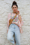 Floral embroidered pink poncho top