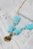 Gold clam shell and blue shell necklace