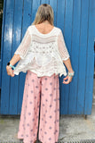 Scalloped floral crochet top