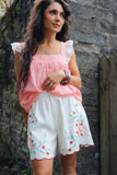 Floral embroidered linen shorts